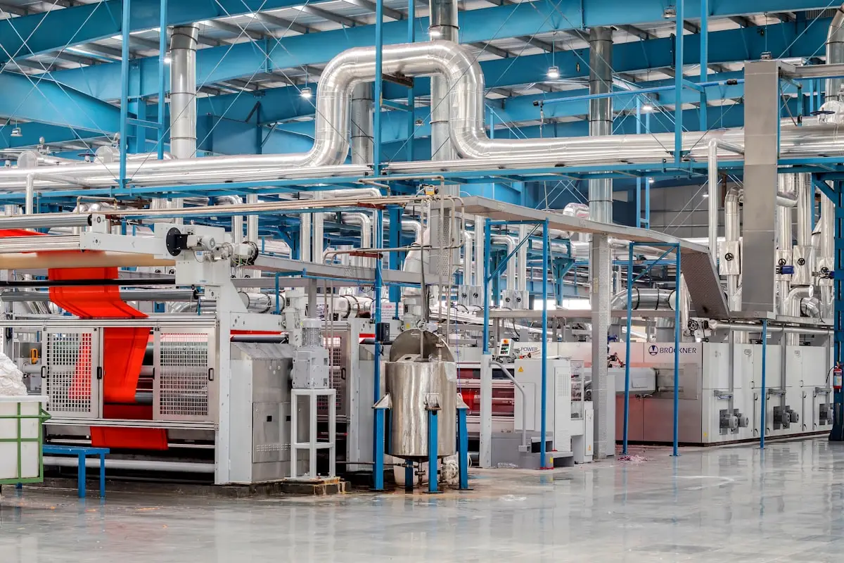 Industrial textile factory with machinery and pipes
